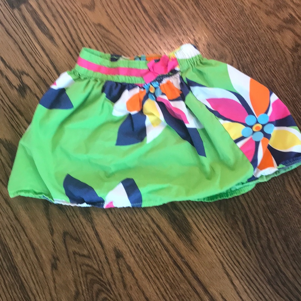 A green skirt with flowers